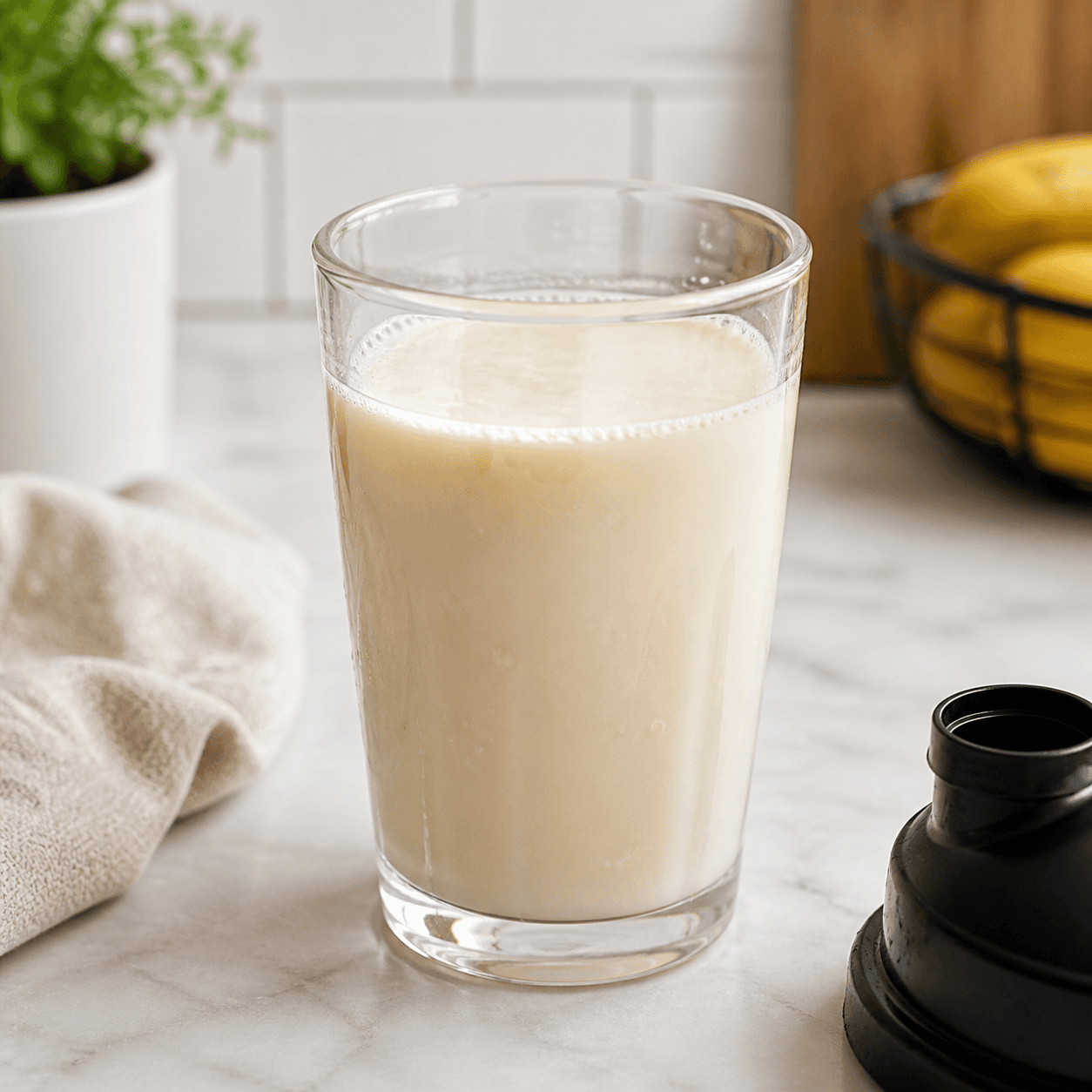 Whey protein mixed with water in a clear glass